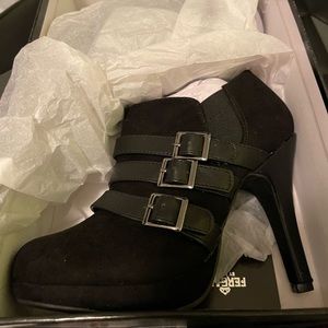 New, never worn still in box Fergalicous angle boots.